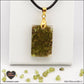 Rectangular Peridot pendant M.1 in brass orgonite