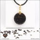 Round black obsidian pendant M.1 in brass orgonite