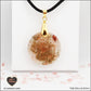 Pendentif Tourmaline Melon d'eau rond M.2 en orgonite laiton