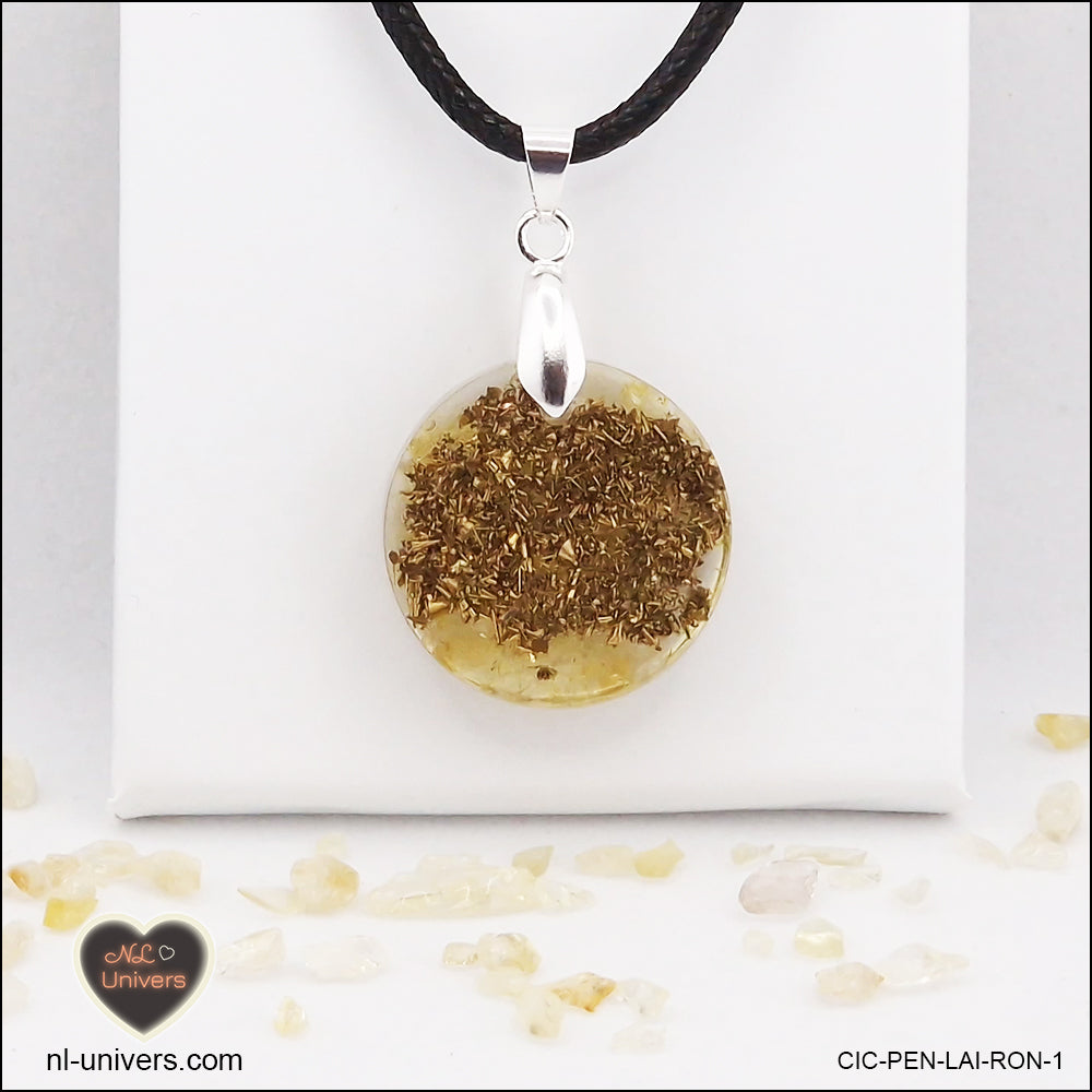 Pendentif Citrine chauffée rond M.1 en orgonite laiton