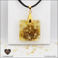 Heated Citrine pendant square M.2 in brass orgonite