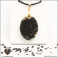 M.2 oval black obsidian pendant in brass orgonite