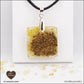 Heated Citrine pendant square M.2 in brass orgonite