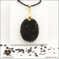 M.2 oval black obsidian pendant in brass orgonite