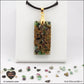 Ruby-Zoisite rectangle pendant M.2 in brass orgonite