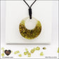 Peridot donut pendant in brass orgonite