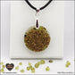 Round Peridot pendant M.2 in brass orgonite