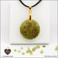 Round Peridot pendant M.2 in brass orgonite