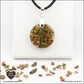 Round Unakite pendant M.1 in brass orgonite