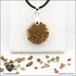 Pendentif Unakite rond M.1 en orgonite laiton