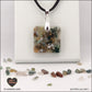 Pendentif Agate Indienne carré M.1 en orgonite laiton