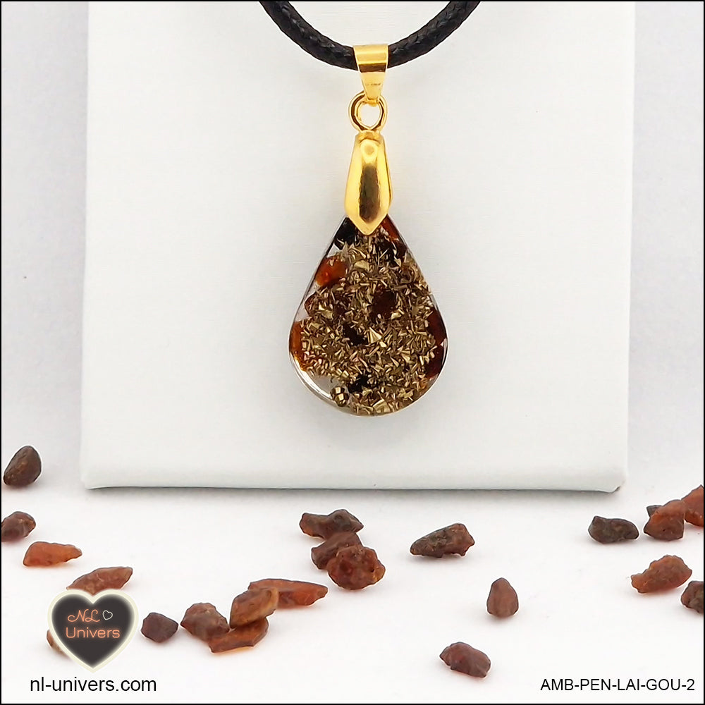 Amber drop pendant in brass orgonite