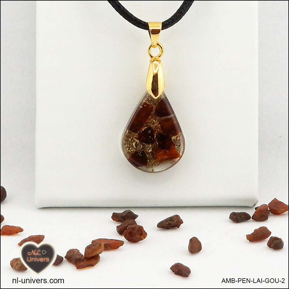 Amber drop pendant in brass orgonite