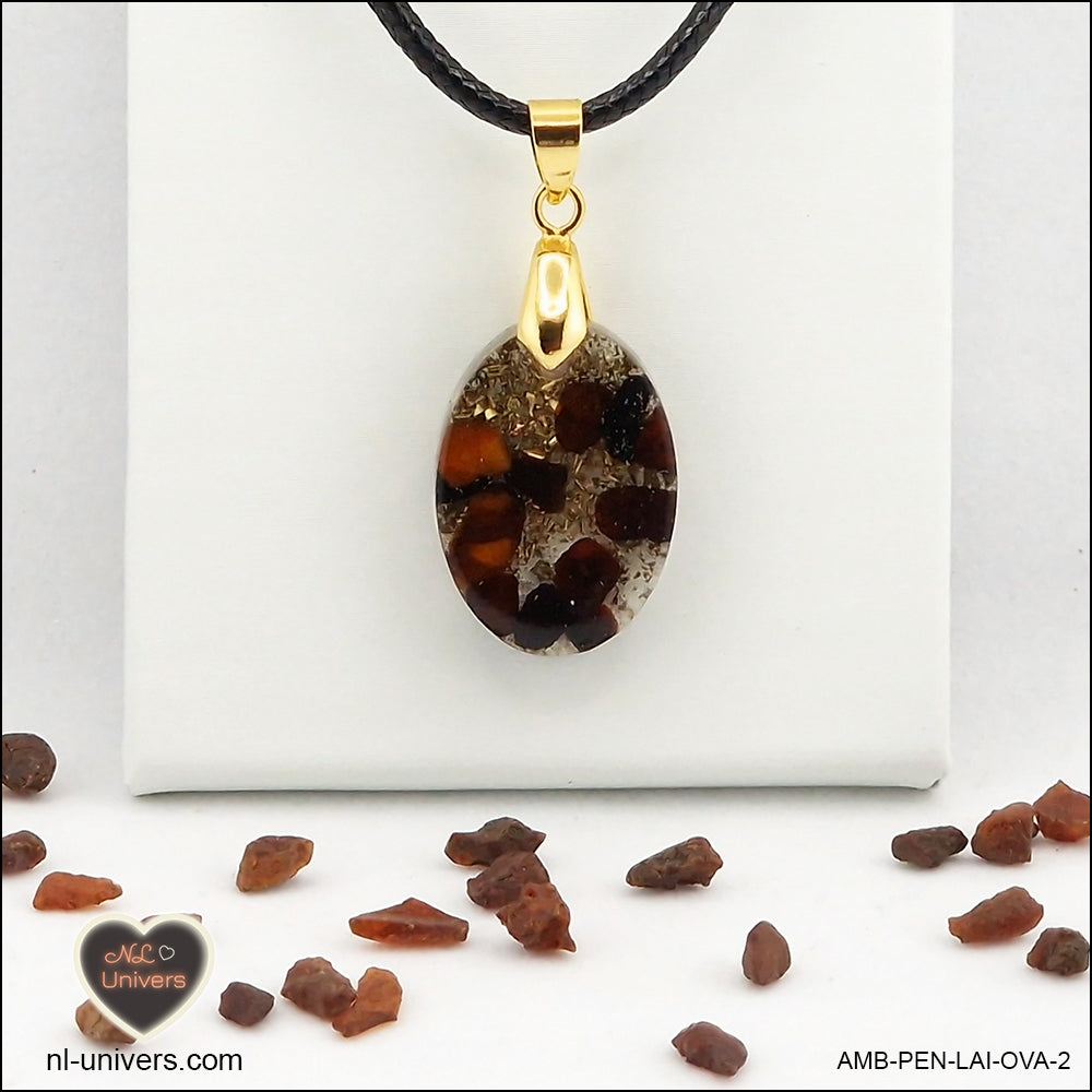 Amber oval pendant M.1 in brass orgonite