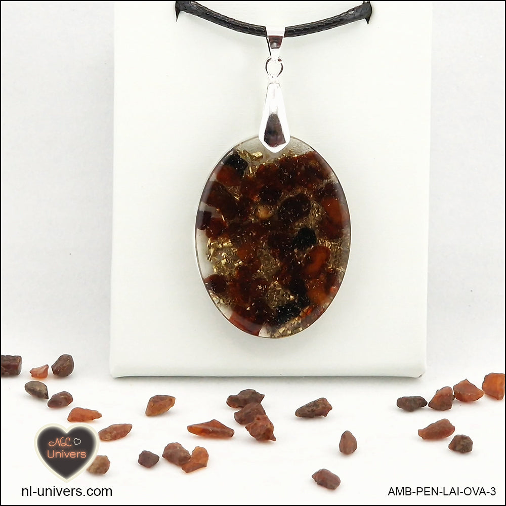 Amber oval pendant M.2 in brass orgonite