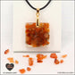 Pendentif Cornaline carré M.2 en orgonite laiton