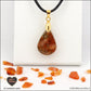 Carnelian drop pendant in brass orgonite