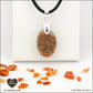Pendentif Cornaline ovale M.1 en orgonite laiton