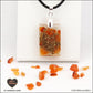 Pendentif Cornaline rectangle M.1 en orgonite laiton