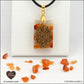 Pendentif Cornaline rectangle M.1 en orgonite laiton