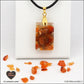 Pendentif Cornaline rectangle M.1 en orgonite laiton