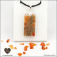 Pendentif Cornaline rectangle M.2 en orgonite laiton