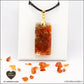 Pendentif Cornaline rectangle M.2 en orgonite laiton