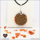 Round Carnelian pendant M.2 in brass orgonite