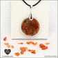 Round Carnelian pendant M.2 in brass orgonite