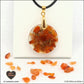Round Carnelian pendant M.2 in brass orgonite