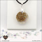 Pendentif Fluorite rond M.1 en orgonite laiton