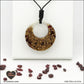 Pendentif Grenat donut en orgonite laiton