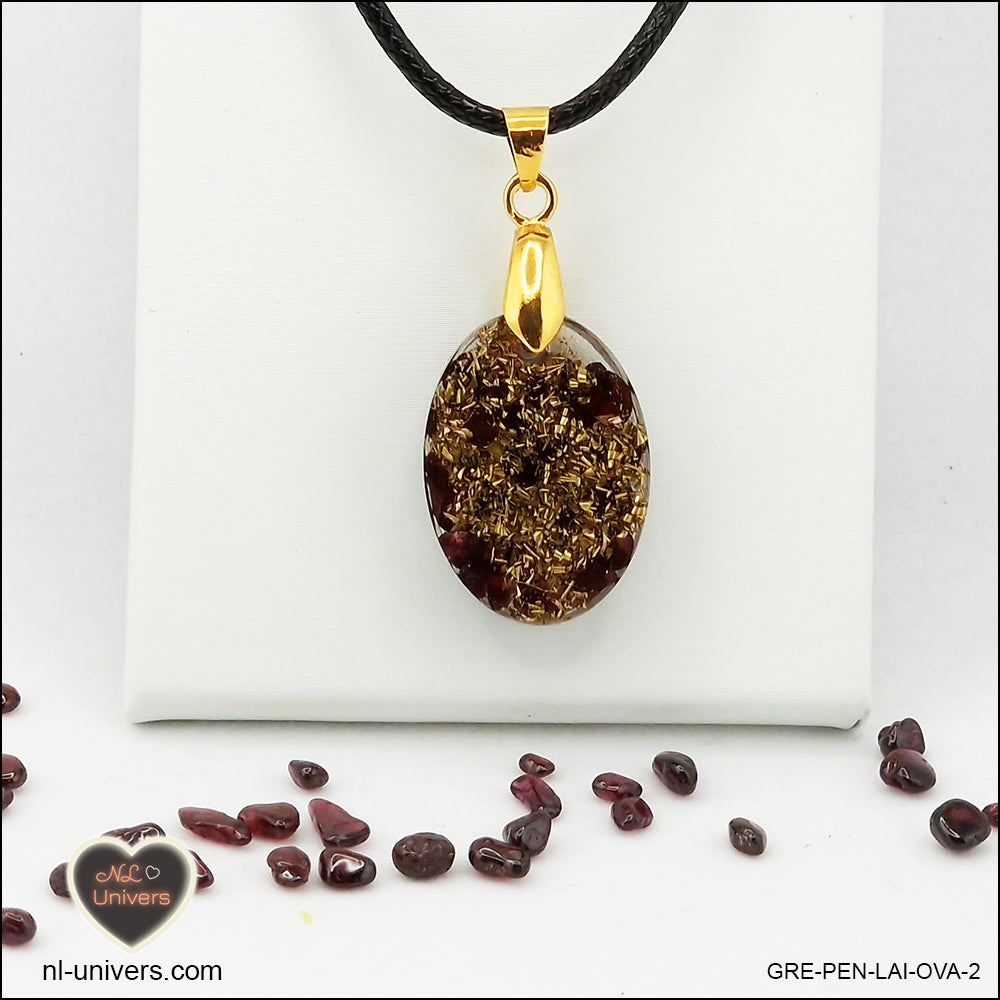 Oval Garnet pendant M.1 in brass orgonite