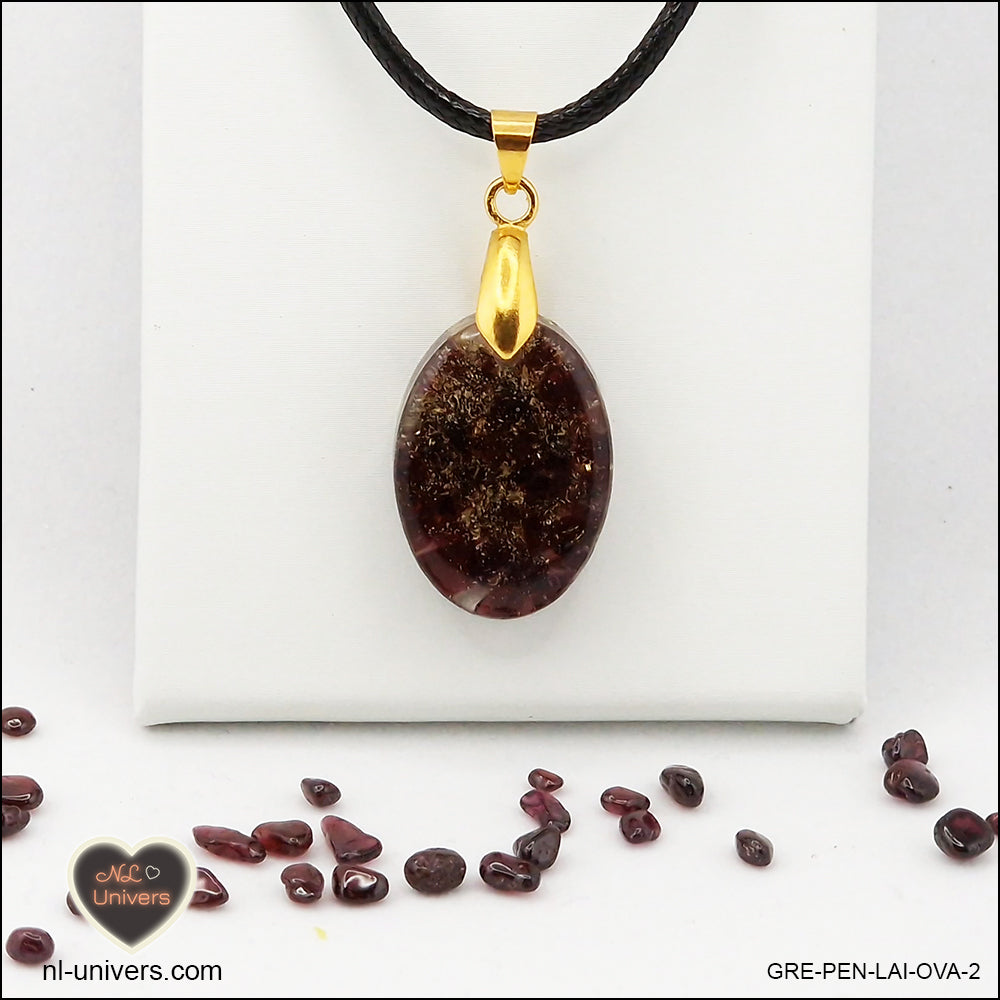 Oval Garnet pendant M.1 in brass orgonite