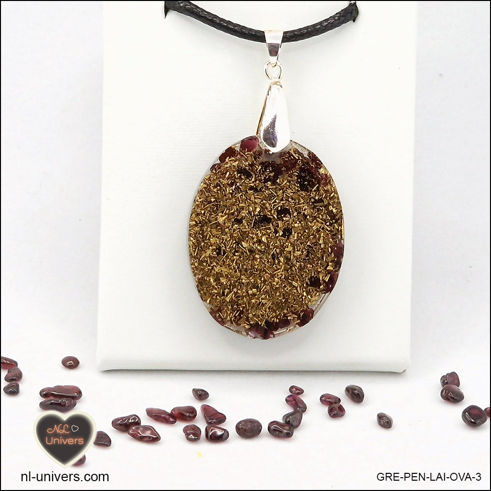 Oval Garnet pendant M.2 in brass orgonite