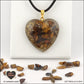 Pendentif Œil de Tigre cœur M.3 en orgonite laiton