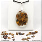 Pendentif Œil de Tigre ovale M.2 en orgonite laiton